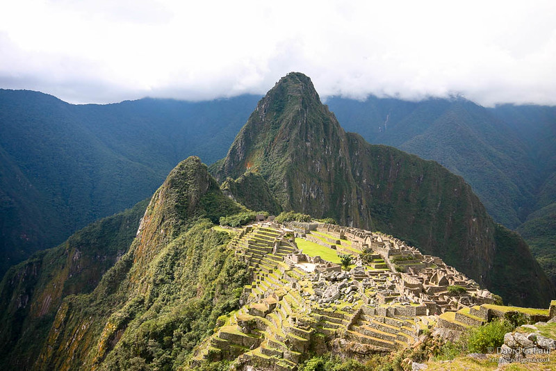 The ruins of Machu Picchu in front of the peak of Huayna Picchu