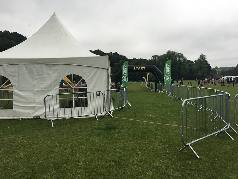 A white tent, some barriers, and a start line