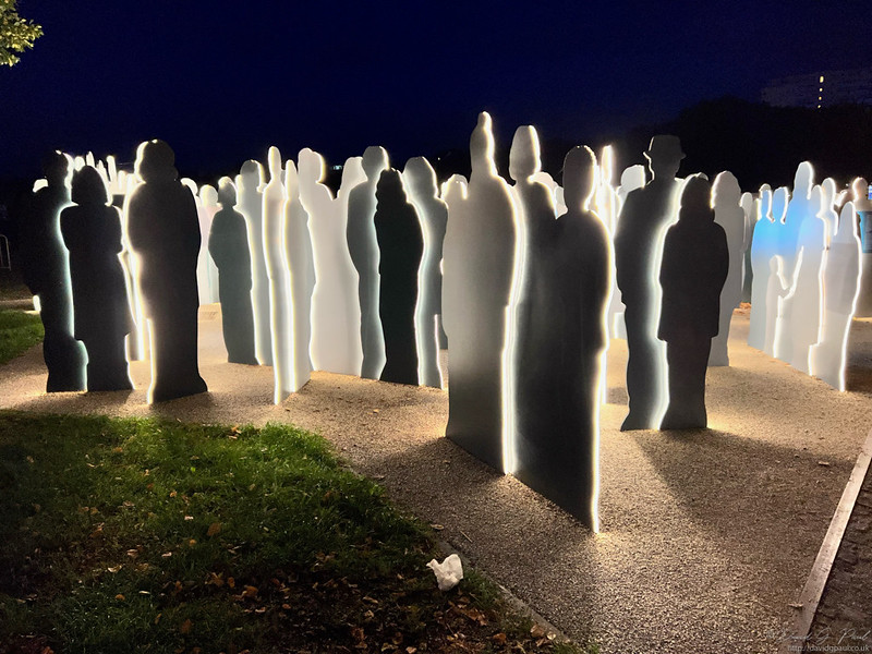 Cutouts representing victims of a bombing