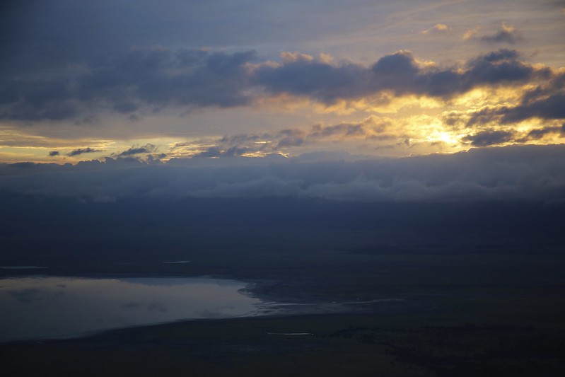 The sun sets over the Ngorongoro Crater